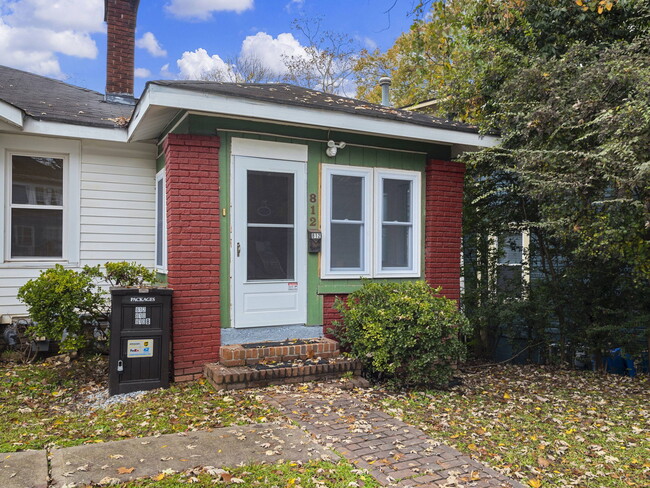 Front door to Sunroom and main entry - 810 Monroe Dr NE