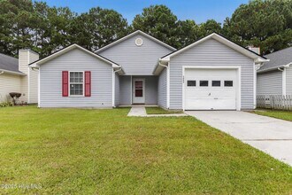 Building Photo - Adorable home with City Convenience!