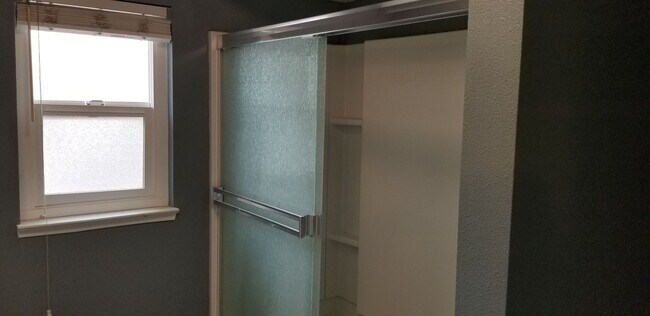 Building Photo - Updated Two Bedroom Condo with Warm Fireplace