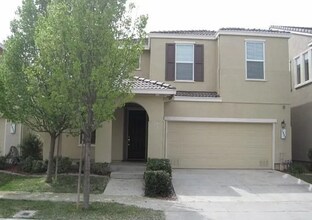 Building Photo - IMMACULATE NATOMAS 4/3 plus office!  Pleas...