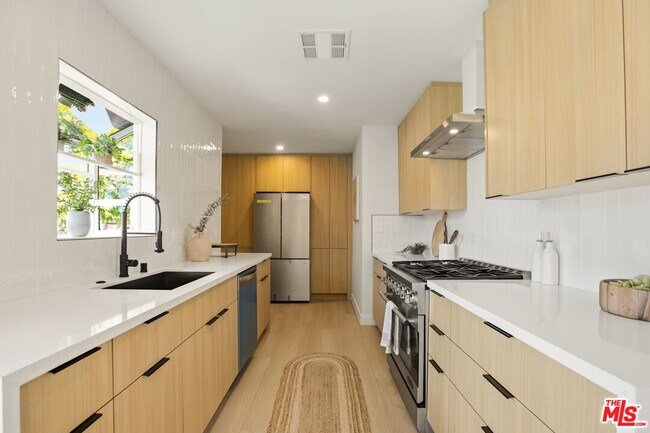 Building Photo - 7358 Paso Robles Ave