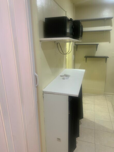 Counter with microwave - 2721 SW 8th St