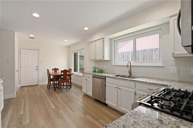 Building Photo - 4-bedroom, 1-story home with dedicated office space and large backyard!