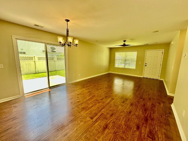 Building Photo - Four Bedroom Home with Private Fenced Back...