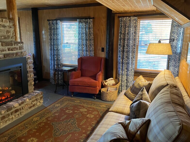 Comfortable living room with electric fireplace - 432 Apache Rd