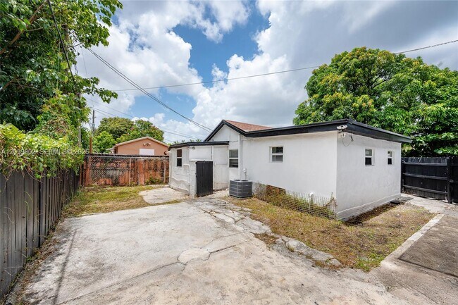 Building Photo - 9050 NW 31st Ave