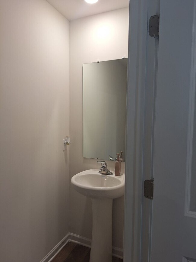 Building Photo - Lovely Four Bedroom Home  Appropriately 5 ...