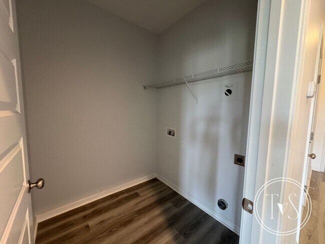 Building Photo - The perfect blend of modern living and small-town charm