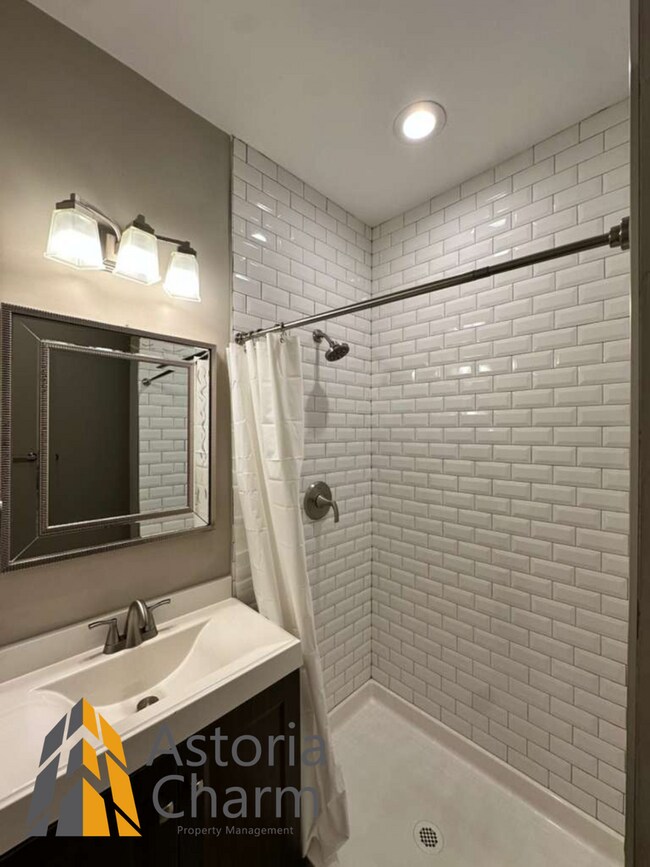Building Photo - Beautifully Renovated 3BR Rowhome Near Johns Hopkins – Gated Parking + Modern Upgrades