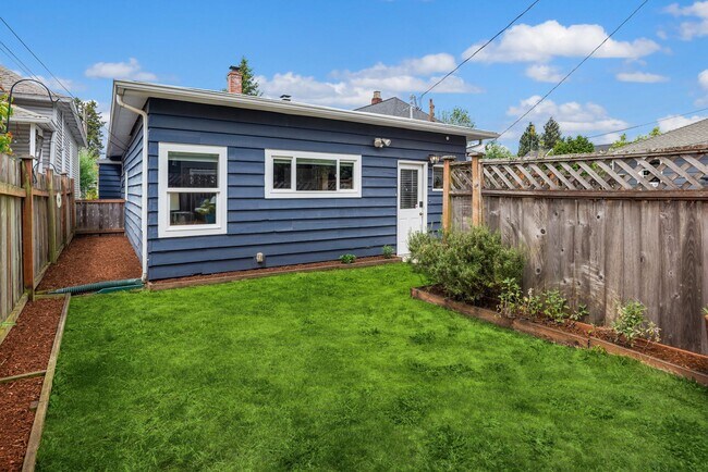 Building Photo - Stylish Queen Anne Bungalow with Vibrant Curb Appeal