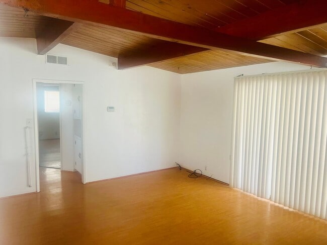 Building Photo - Charming 3-Bedroom Home with Wood Ceilings...