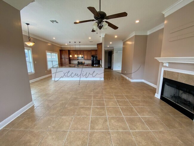 Building Photo - Family Home in Lafitte Landing – Fenced Ya...