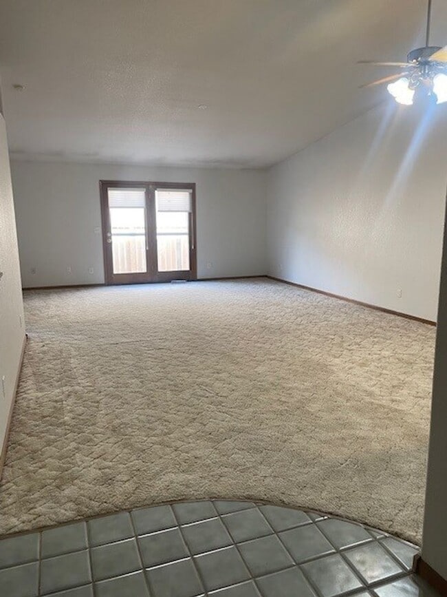 Building Photo - Spacious 3 Bed 3 Bath Townhome with Finished Basement & 2-Car Garage