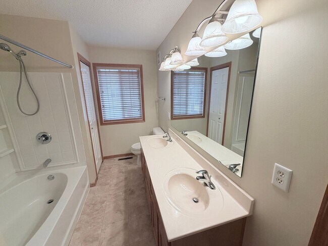 Building Photo - Spacious Bailey’s Arbor Townhome! 2BR + Bonus Living Room & Resort-Style Amenities!!