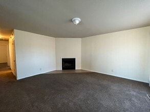 Building Photo - Sheridan Duplexes 01-03