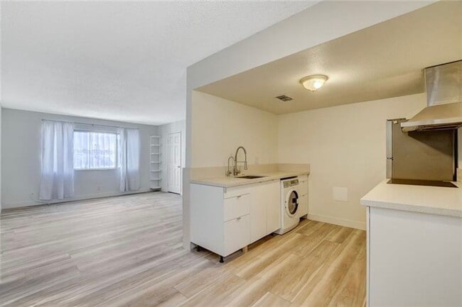 Building Photo - Completely Updated and Move-In Ready, 2 bedroom, 1 bath first floor unit!