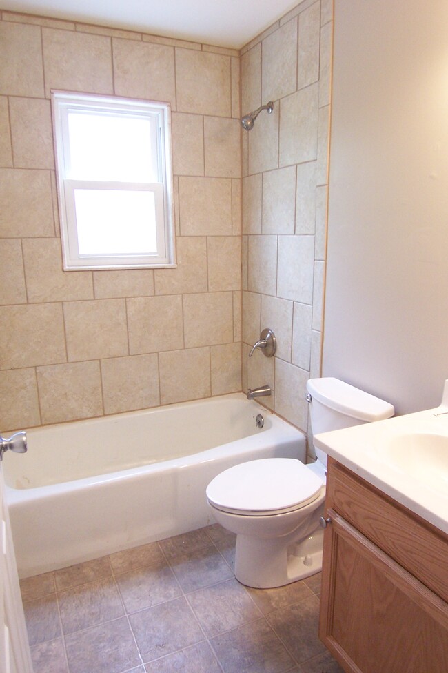 Full bath upstairs with tile shower - 4795 Lorraine Ave