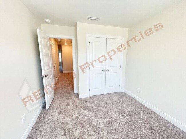 Building Photo - Brand New 3 Bedroom 1-Car Garage Townhome ...