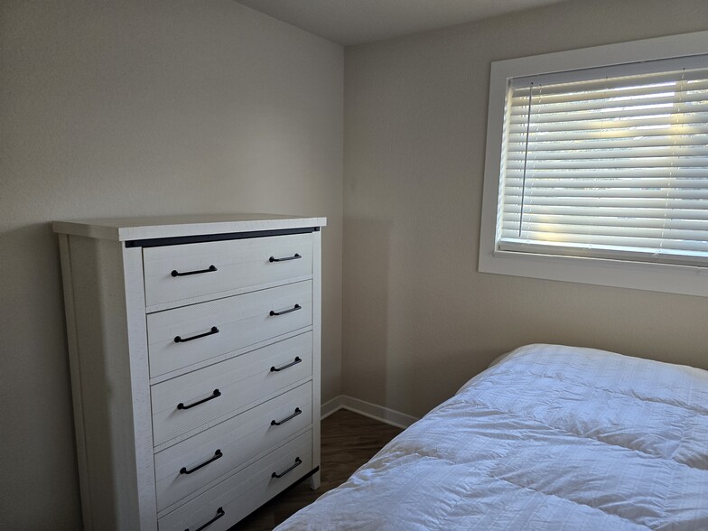 King bedroom upstairs. - 902 S Zephyr Ct