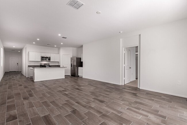 Building Photo - Brand New - Never Lived In 3 Bedroom / 2 B...