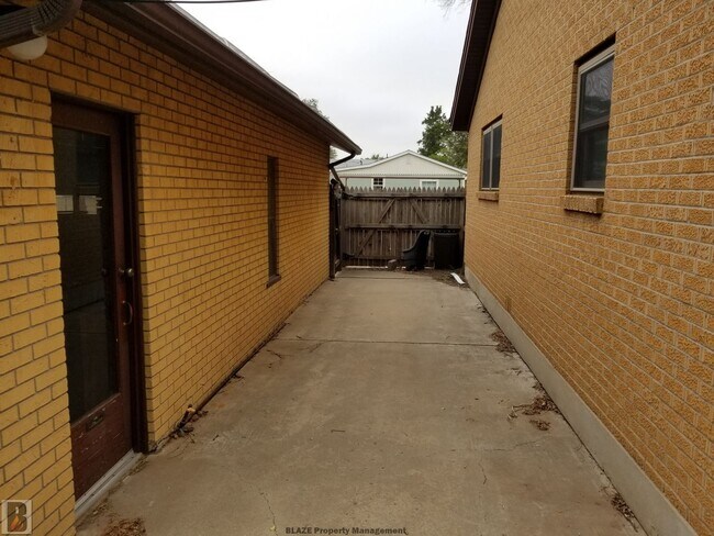 Building Photo - Massive Corner-Lot Home with Retro Charm & Shady Backyard!