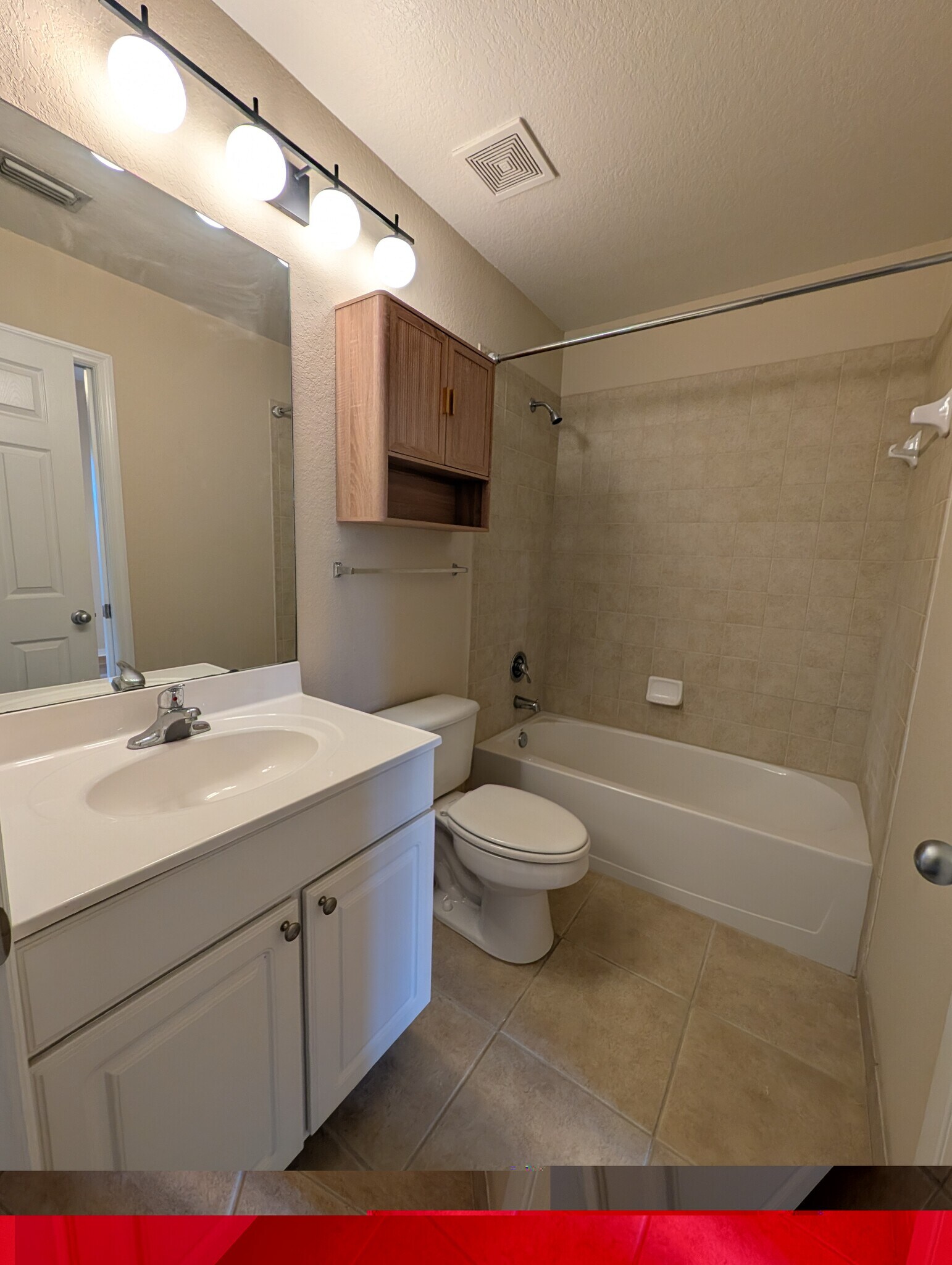 hall bath with additional access from second bedroom - 5218 Hampton Beach Pl