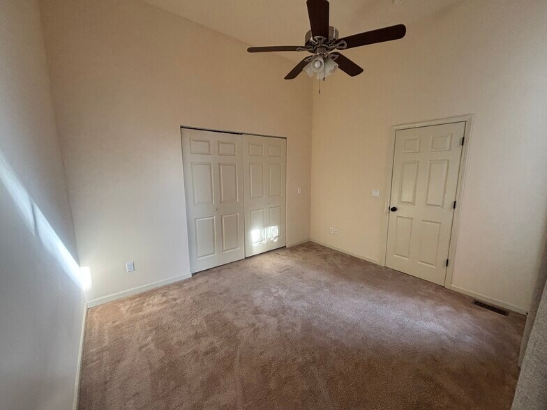 Bedroom towards closet doors and entry door - 2325 S 10th St