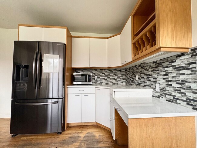 Building Photo - Charming 3-Bedroom Millcreek Home!