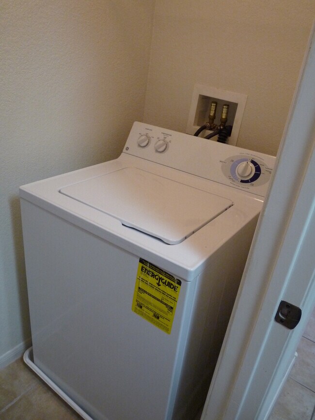 Building Photo - GATED 2 BEDROOM, 2 BATH CONDO IN JASMINE RANCH COMMUNITY