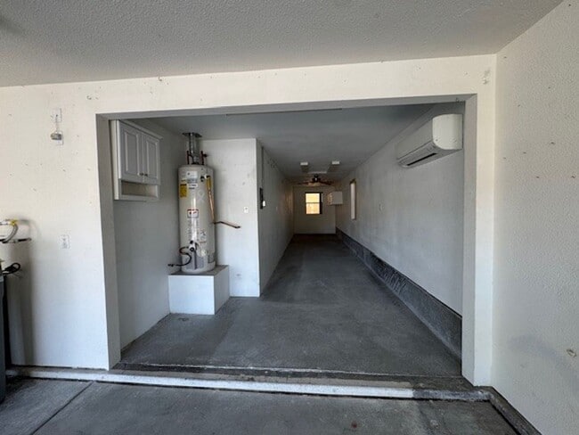 Building Photo - 2BR + 2 BONUS ROOMS with 54 foot Long Boat/Toys DEEP Garage