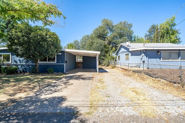 Building Photo - Home with Carport