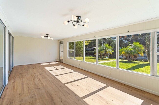 Building Photo - Charming 2BR/2BA Waterfront Home for Rent with Canal Access & Two Garages