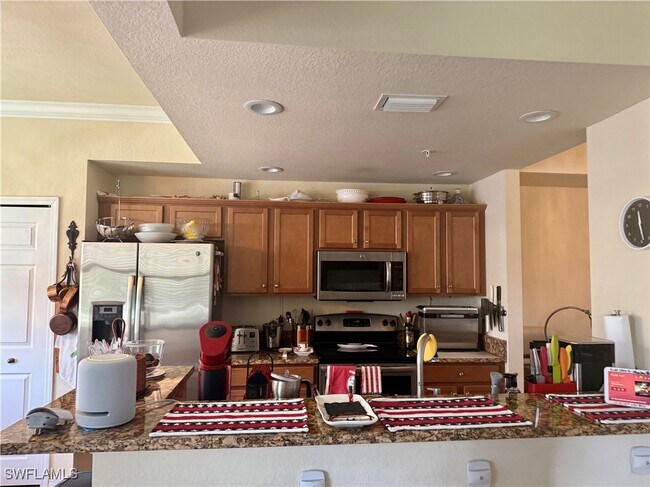 Building Photo - 9723 Acqua Ct