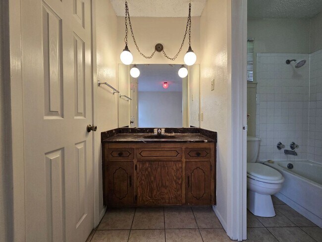 Building Photo - NEW IN MANAGEMENT - AVAILABLE NOW!