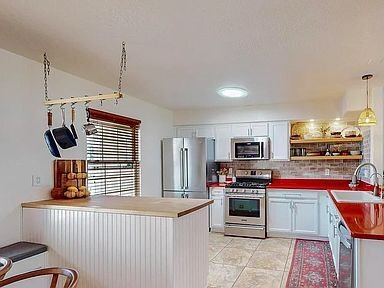 Building Photo - 10251 Rempas Dr NW
