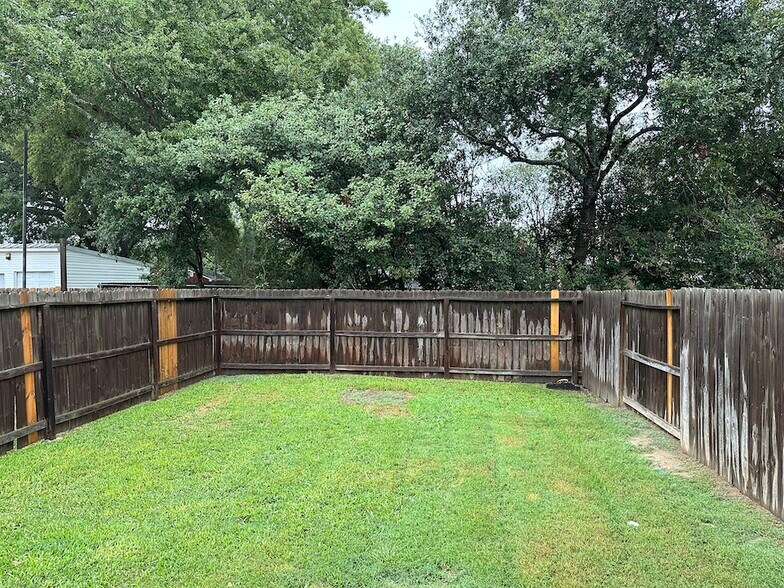 Fenced backyard - 521 E House St
