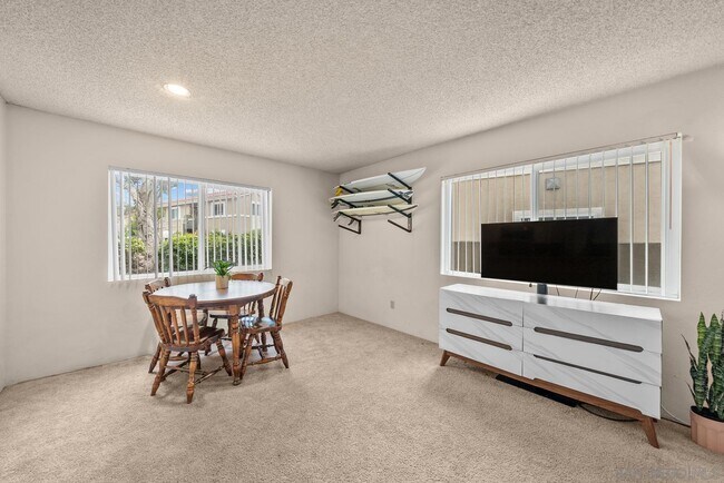 Building Photo - 7565 Charmant Dr