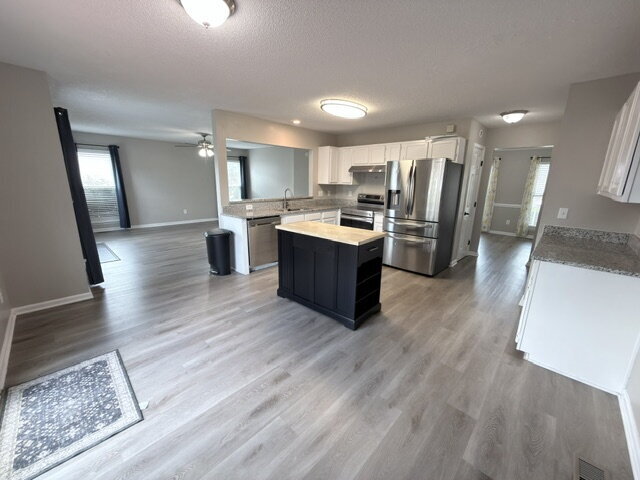 Building Photo - Spacious 4BR Home with Fenced Yard, Community Pool & 2-Car Garage