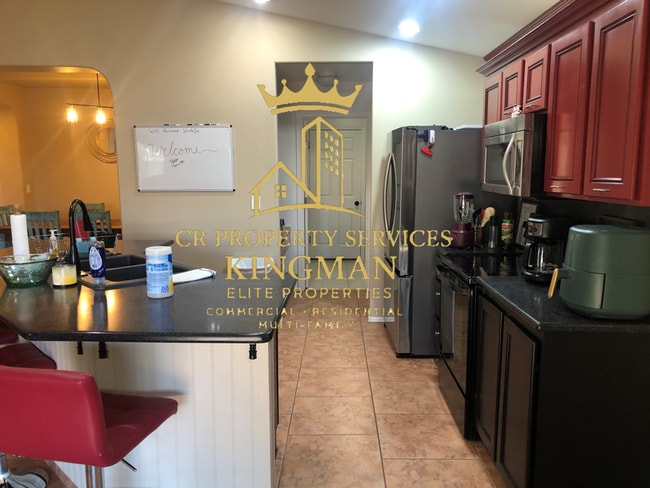Building Photo - Spacious 3-Bedroom Home with Private Backyard Retreat – Fully Furnished & Utilities Included
