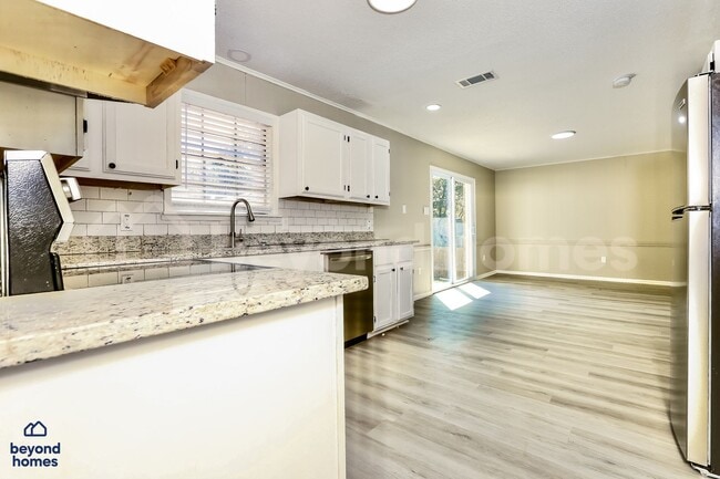 Building Photo - Amazing Renovated 4 BR 3 BA Home -- Move-In Ready!