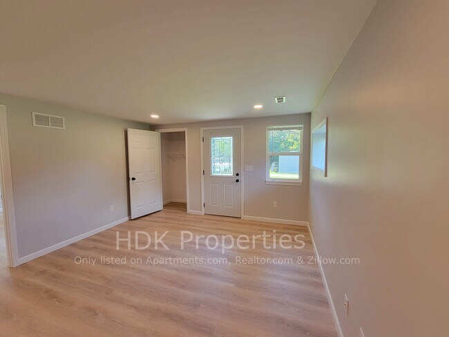 Living room facing front door - 1566 Sugar Grove Rd