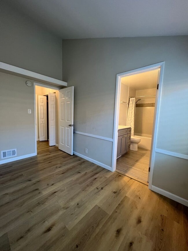 Building Photo - Great Natural light, Treetop Views with 2 Primary Suites plus OFFICE and a 2 car garage, It is li...