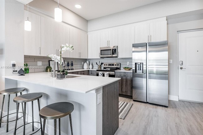 Building Photo - 9125 W Commercial Blvd