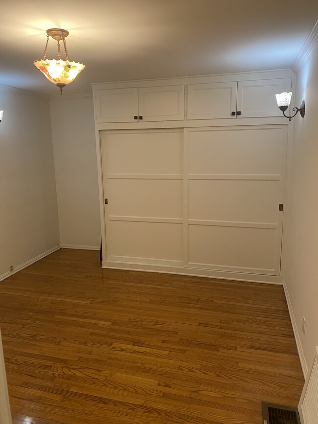 Bedroom with wide closet, storage above, any private space to do your work on the left. - 1857 Pandora Ave