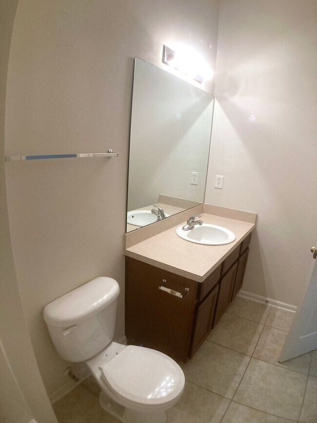 Building Photo - Spacious 3-Bedroom Condo with Pond Views &...