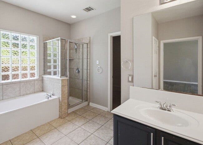 Building Photo - Updated two story. Gated subdivision. Gorgeous patio and yard!