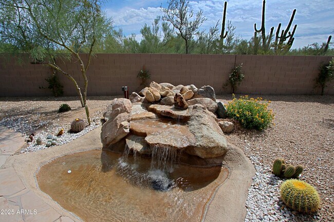 Building Photo - 6879 E Amber Sun Dr