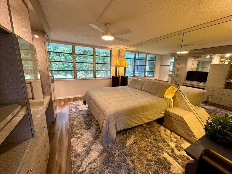 Primary Bedroom with King Adjustable Bed - 933 Cypress Grove Dr