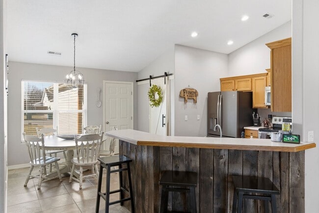 Building Photo - 3 Bedroom | 2 Bathroom | 2 Car Garage | Nixa Schools| Fireplace | Fenced yard | Solar Panels!