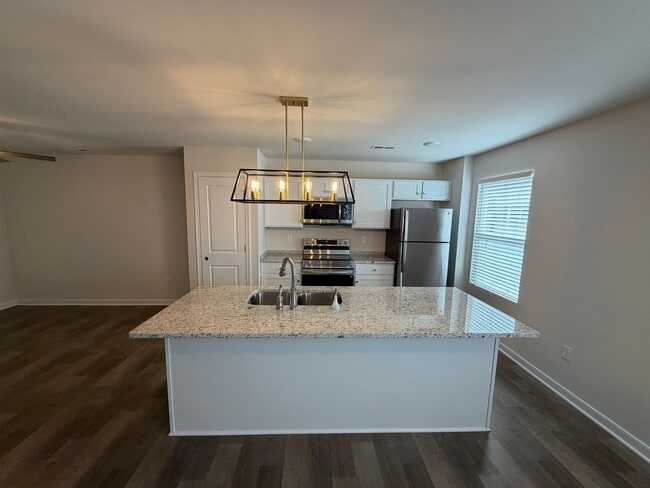 Building Photo - Modern Two-Story Townhome with Open Floor Plan and Garage